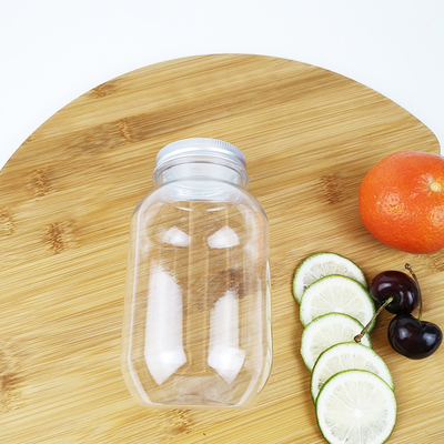Latas do armazenamento do alimento de 0,5 litros com os recipientes plásticos dos tampões para o leite das bebidas